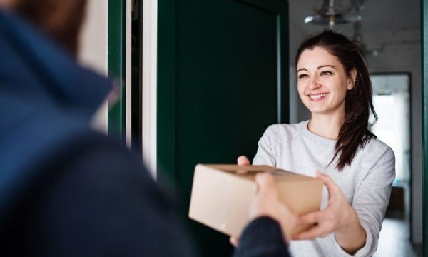 a woman receiving her package